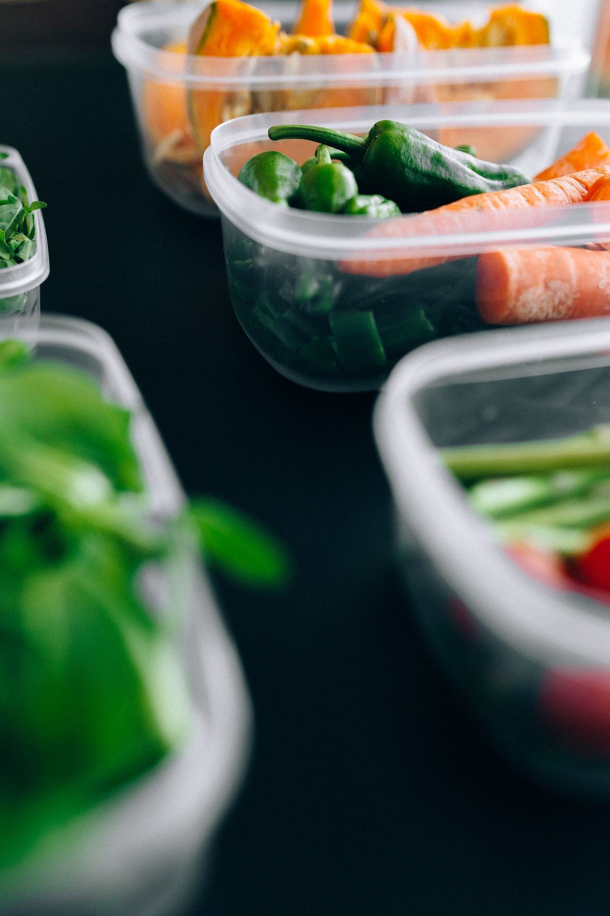 Prepped vegetables stored in containers to prevent spoilage