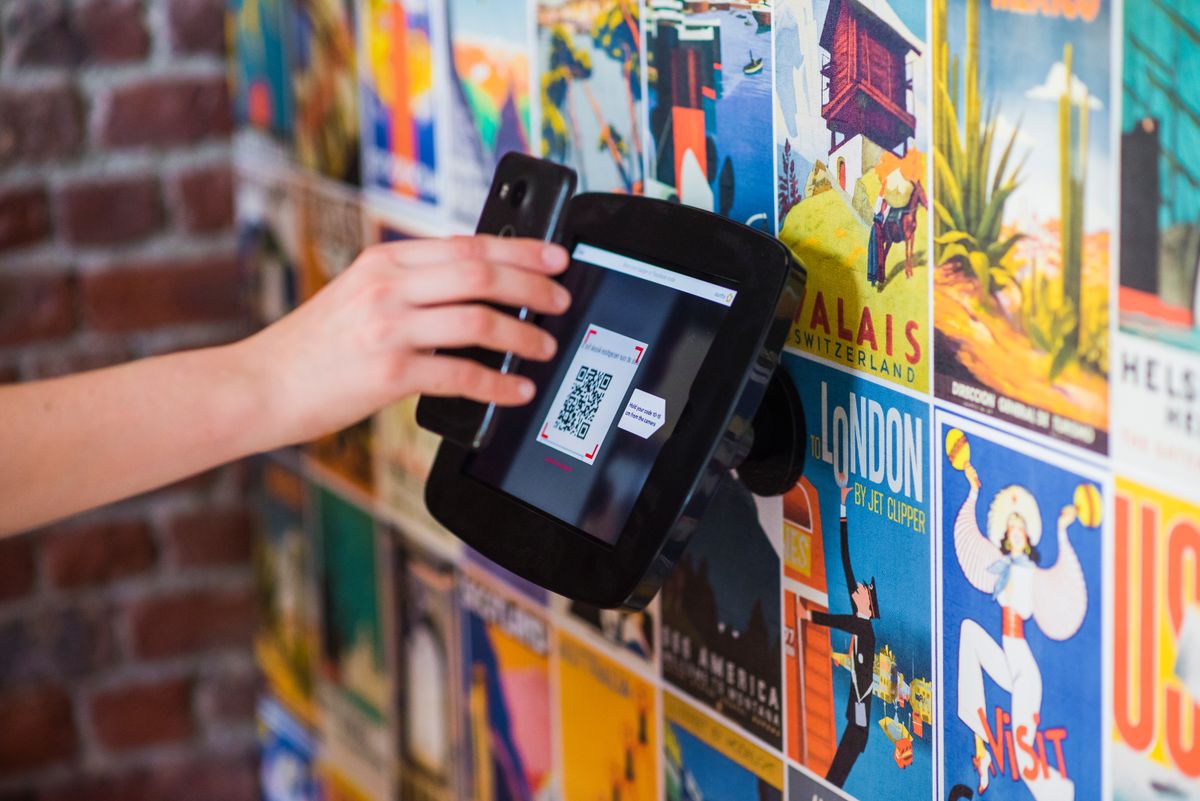 Scanning a QR code to open a menu and order from a phone